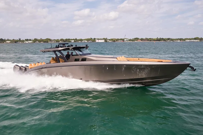 Slide: The Image of 2026 Midnight Express 52 Vitesse yacht cruising on open water. - 8