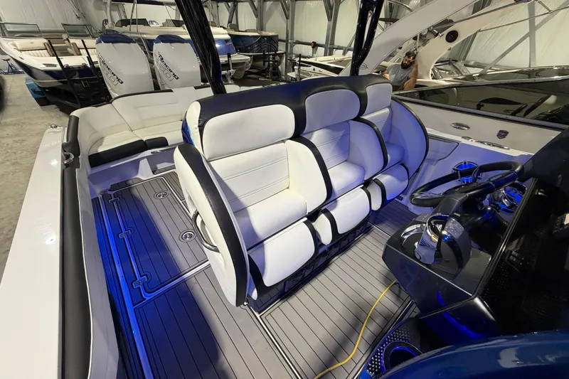 Slide: The Image of 2020 Nor-Tech 340 Sport Center Console interior with luxurious seating and modern controls. - 35