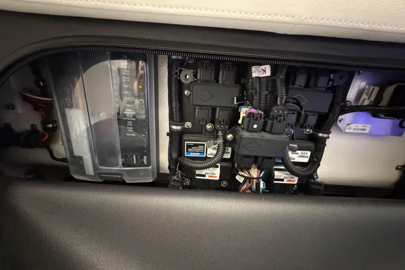 Slide: The Image of Electrical components inside a 2020 Nor-Tech 340 Sport Center Console boat. - 50