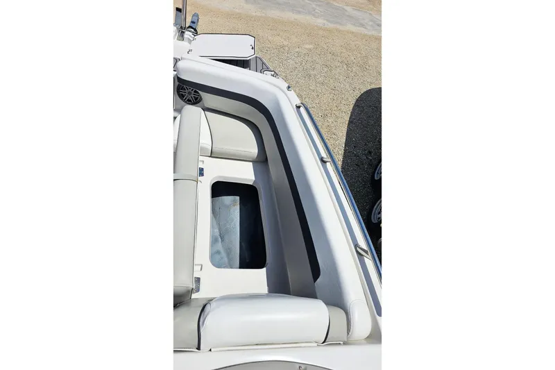 Slide: The Image of 2023 Starcraft SVX 211 OB boat interior with seating and storage compartment. - 11