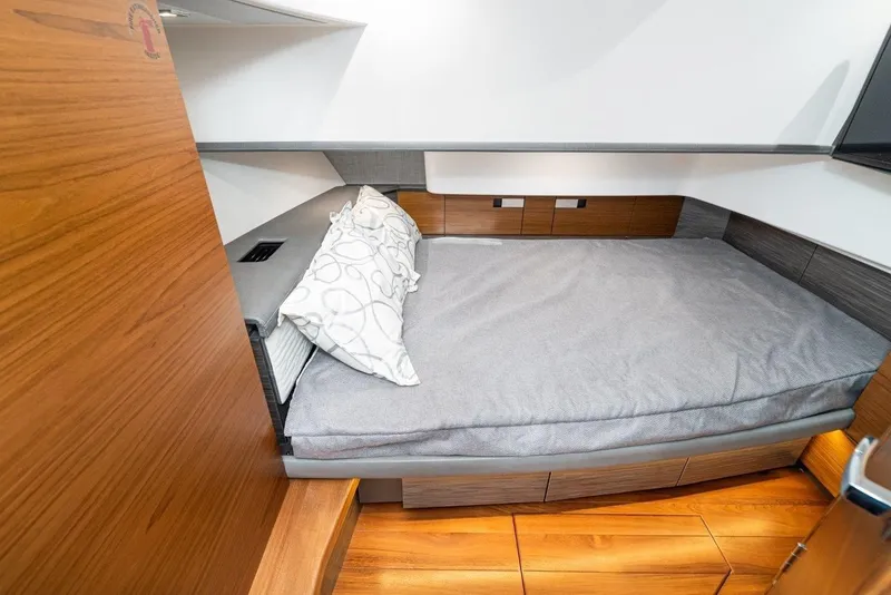 Slide: The Image of Interior of 2019 Tiara Yachts 38 LS with cozy bed. - 12
