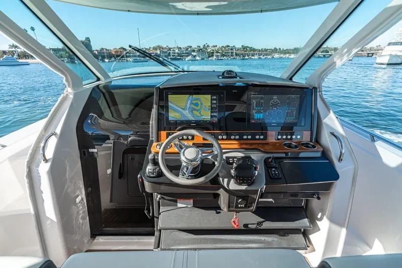 Slide: The Image of Interior view of 2019 Tiara Yachts 38 LS cockpit with modern navigation. - 17