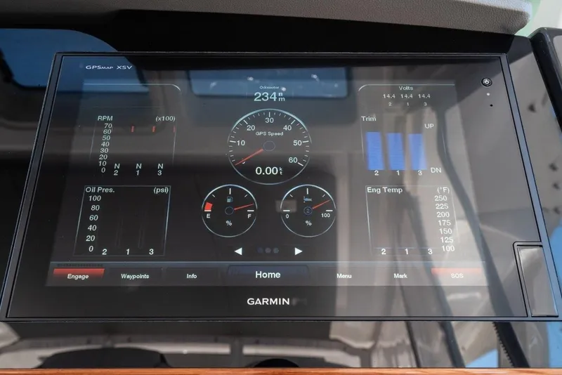 Slide: The Image of Garmin GPS display on 2019 Tiara Yachts 38 LS, showing speed and engine status. - 19