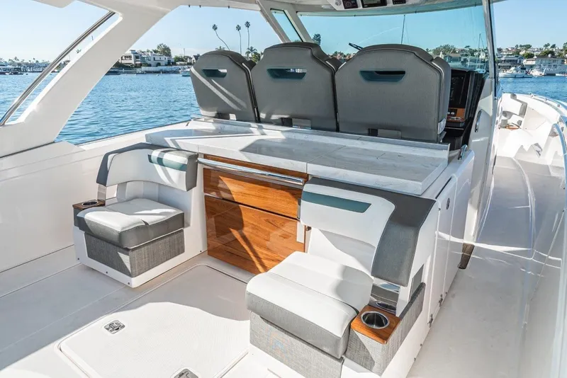 Slide: The Image of Interior of 2019 Tiara Yachts 38 LS with luxurious seating. - 23