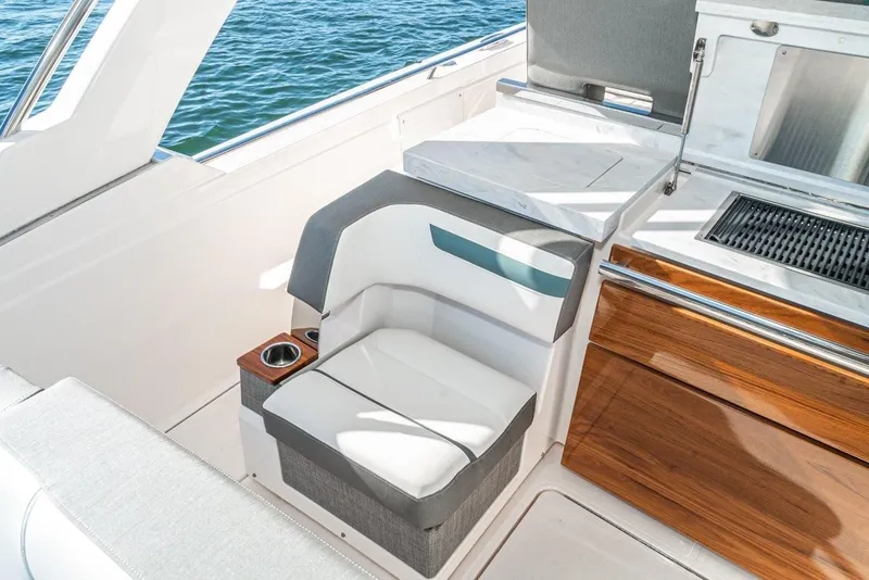 Slide: The Image of Interior of 2019 Tiara Yachts 38 LS with luxurious seating area. - 29