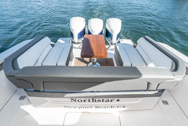 Slide: The Image of 2019 Tiara Yachts 38 LS with luxurious seating and engines. - 31