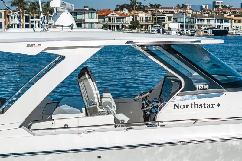 Slide: The Image of 2019 Tiara Yachts 38 LS boat on water, side view. - 49