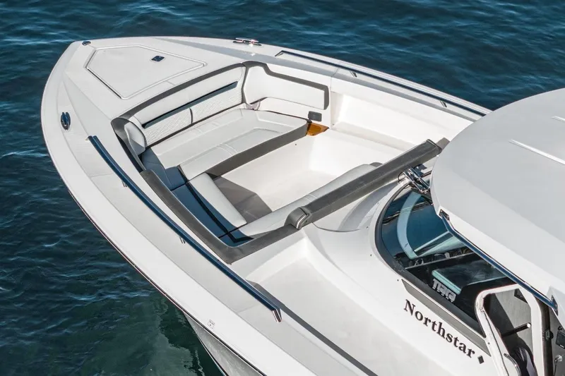 Slide: The Image of 2019 Tiara Yachts 38 LS with luxurious deck design on water. - 7
