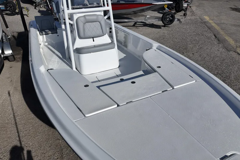 Slide: The Image of 2026 Blazer PureBay 2400 boat with sleek design and spacious deck. - 9