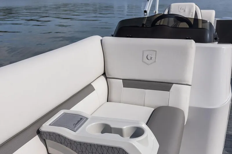 Slide: The Image of Manufacturer Provided Image: 2022 Godfrey Sweetwater 2286 SBX boat interior with cushioned seating and cup holders. - 2