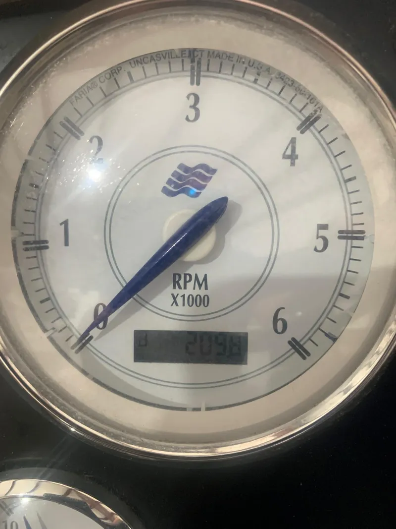 Slide: The Image of Close-up of 2008 Four Winns V258 tachometer displaying RPM and digital readout. - 29