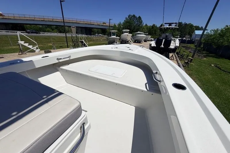 Slide: The Image of 2022 Parker 1801 Center Console boat, white deck, outdoor display, sunny day. - 9