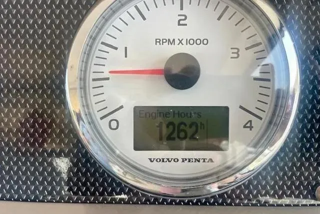 Slide: The Image of Volvo Penta tachometer showing 1262 engine hours on a 2011 Regal 46 Sport Coupe. - 29