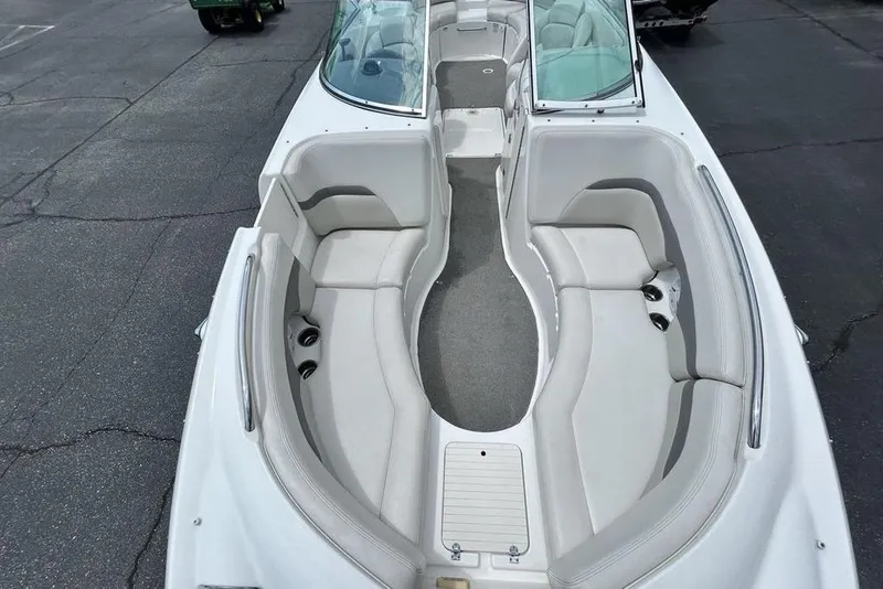 Slide: The Image of 2006 Chaparral Sunesta 274 boat interior with spacious seating and cup holders. - 4