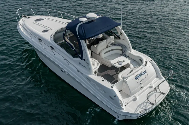 Slide: The Image of 2007 Sea Ray 340 Sundancer yacht cruising on open water. - 17
