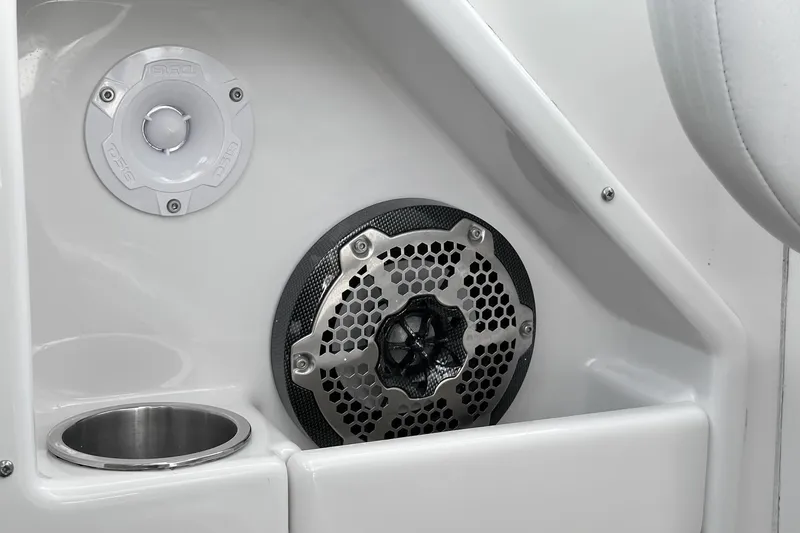 Slide: The Image of Speaker and cup holder on 2007 Sea Ray 340 Sundancer boat interior. - 29
