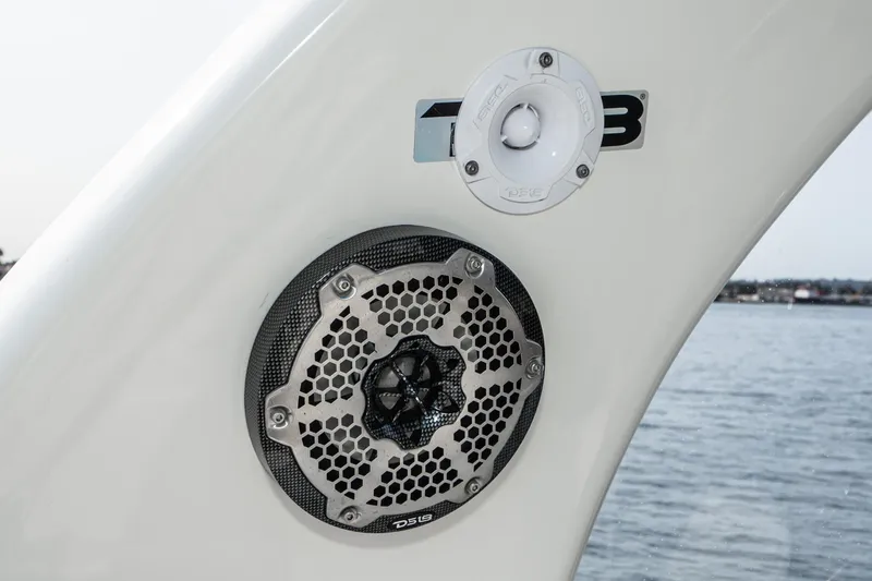 Slide: The Image of Close-up of 2007 Sea Ray 340 Sundancer speaker and light on boat exterior. - 31