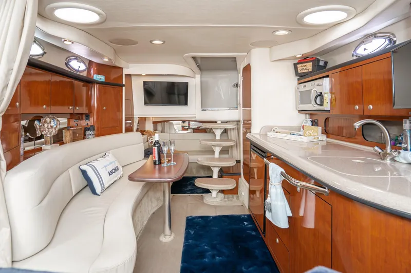 Slide: The Image of Luxurious interior of 2007 Sea Ray 340 Sundancer yacht with modern amenities and elegant design. - 36