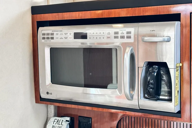 Slide: The Image of Built-in LG microwave and coffee maker on 2007 Sea Ray 340 Sundancer yacht. - 44