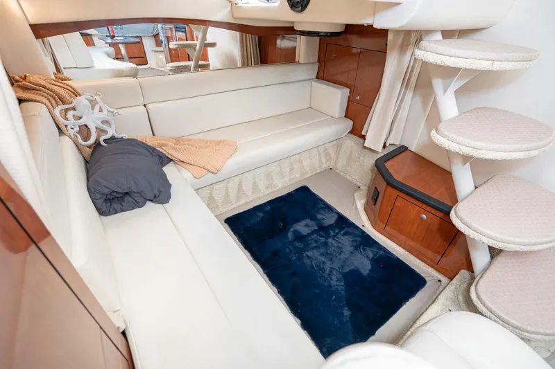 Slide: The Image of Interior of 2007 Sea Ray 340 Sundancer yacht with cozy seating and elegant decor. - 47