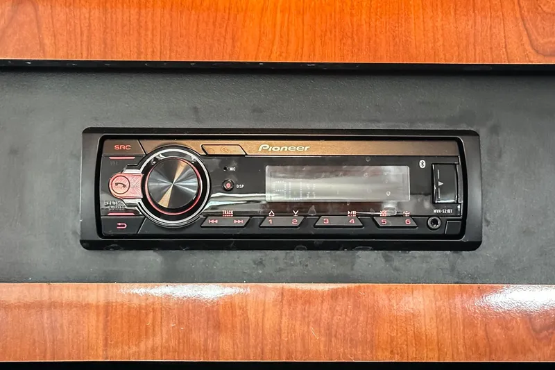 Slide: The Image of Pioneer stereo system in 2007 Sea Ray 340 Sundancer boat dashboard. - 51