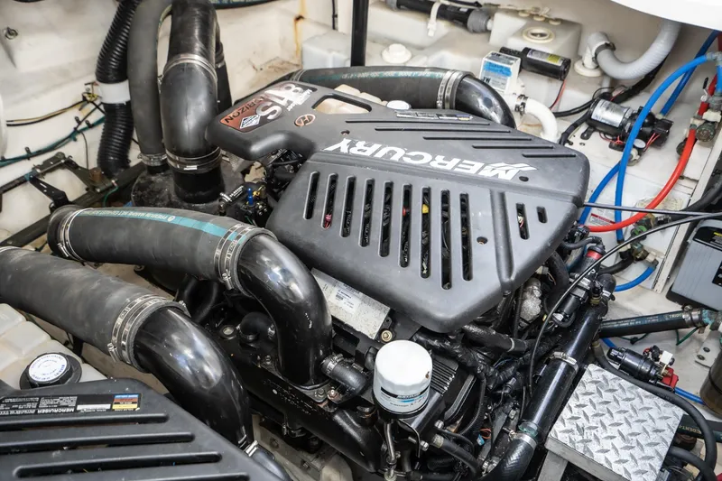 Slide: The Image of Engine compartment of a 2007 Sea Ray 340 Sundancer with a Mercury engine. - 55