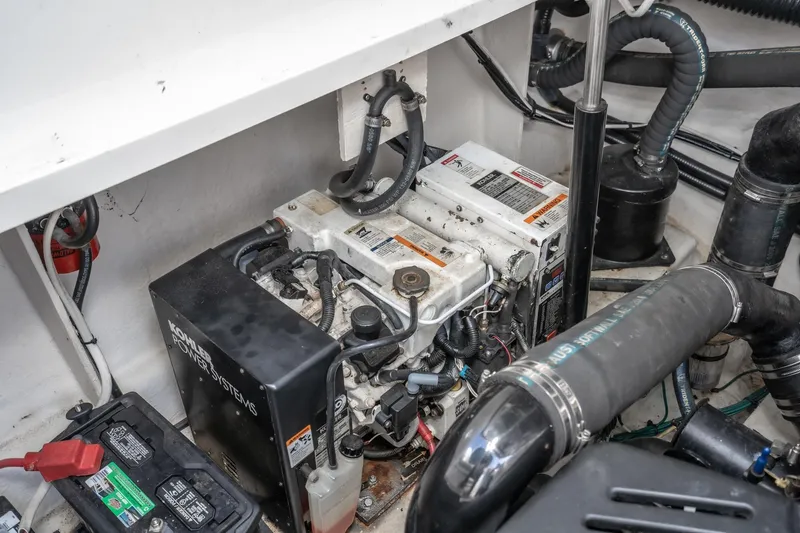 Slide: The Image of Engine compartment of 2007 Sea Ray 340 Sundancer with Kohler power system. - 56