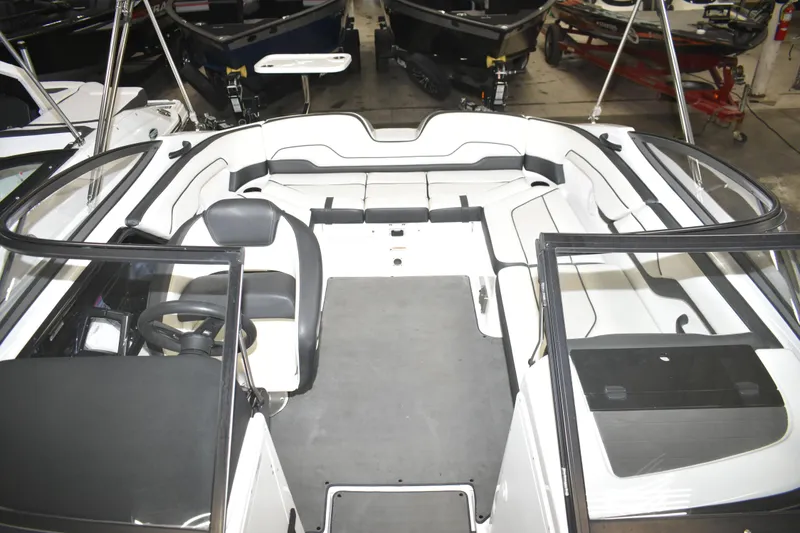 Slide: The Image of 2017 Yamaha SX210 boat interior with sleek seating and modern design. - 6