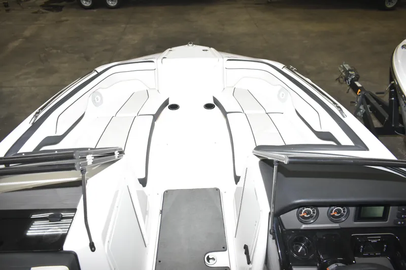 Slide: The Image of 2017 Yamaha SX210 boat interior with seating and dashboard view. - 8