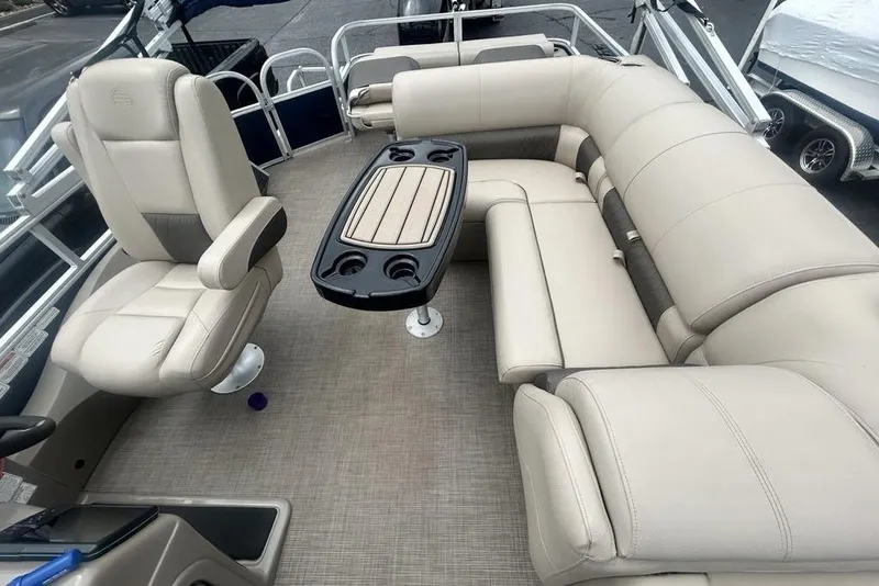 Slide: The Image of Luxurious interior of 2021 Sun Tracker SportFish 22 DLX pontoon boat with plush seating. - 20