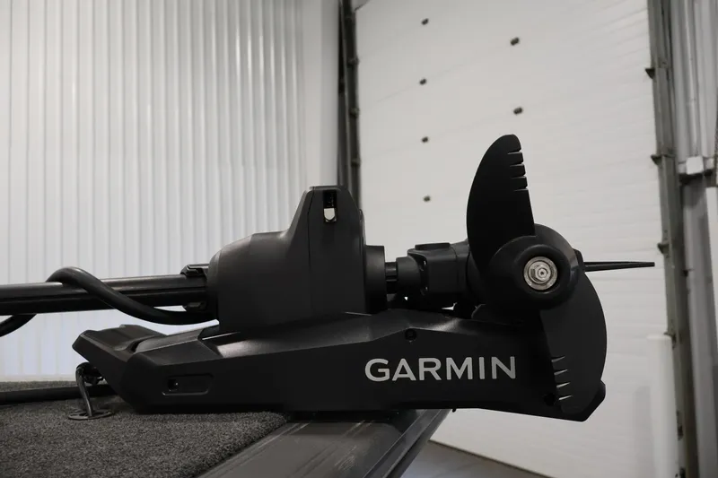Slide: The Image of Garmin trolling motor on 2025 Crestliner 1950 Fish Hawk WT boat in garage. - 12