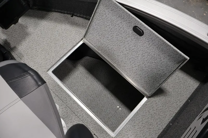Slide: The Image of 2025 Crestliner 1950 Fish Hawk WT boat with open storage compartment. - 18