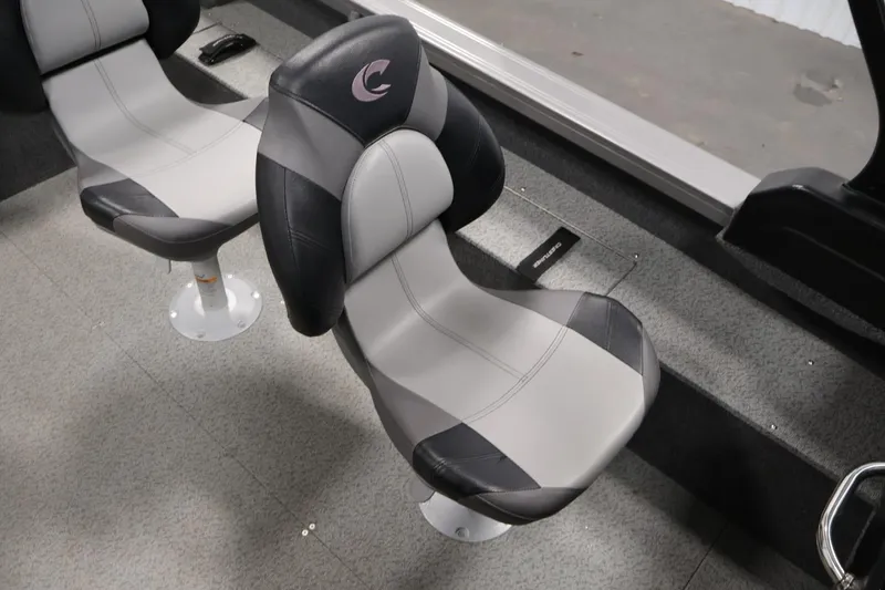 Slide: The Image of 2025 Crestliner 1950 Fish Hawk WT boat seats, featuring sleek black and gray design. - 30