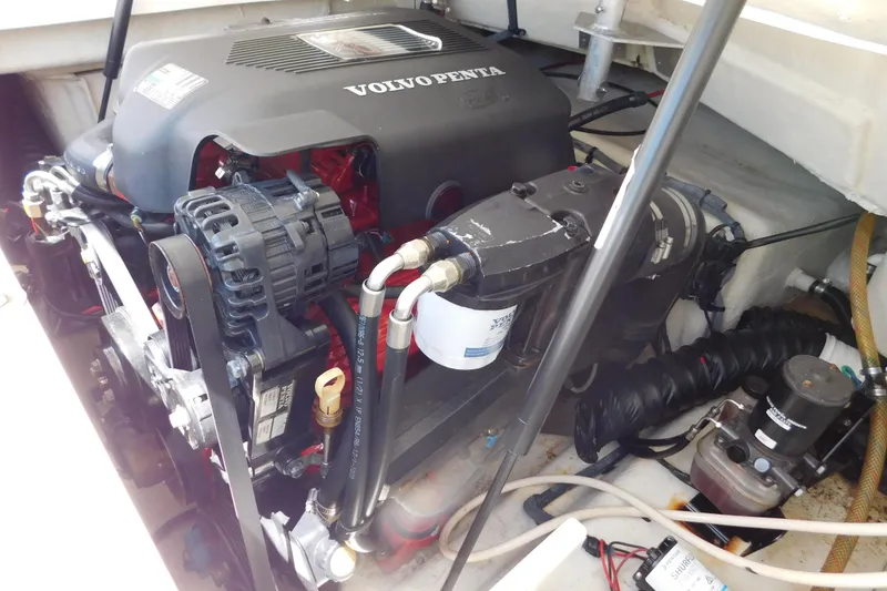 Slide: The Image of Volvo Penta engine in a 2004 Regal 2250 LSC boat, showcasing detailed components. - 27