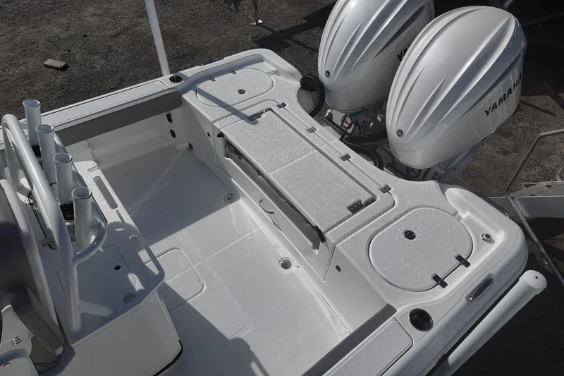 Slide: The Image of 2026 Blazer Bay Makaira 2800 boat deck with dual Yamaha engines. - 14