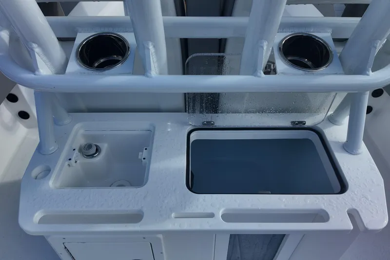 Slide: The Image of Fishing station on 2026 Blazer Bay Makaira 2800 boat with rod holders and storage compartments. - 16