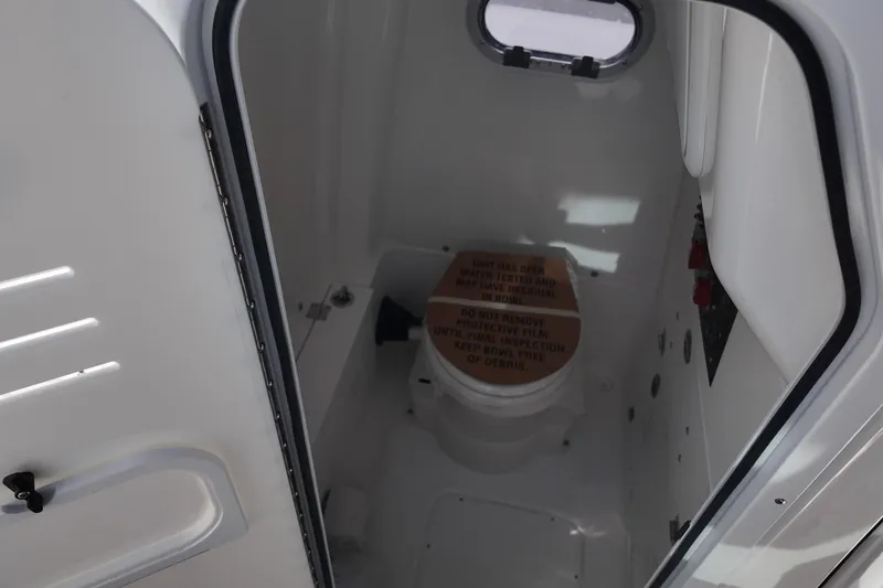 Slide: The Image of Interior view of 2026 Blazer Bay Makaira 2800 boat restroom with compact design. - 17