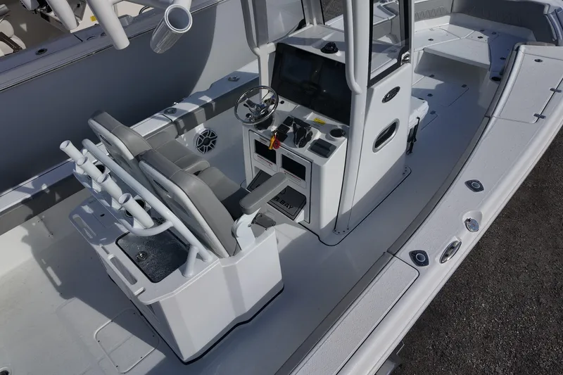 Slide: The Image of 2026 Blazer Bay Makaira 2800 boat interior with dual seats and control console. - 6