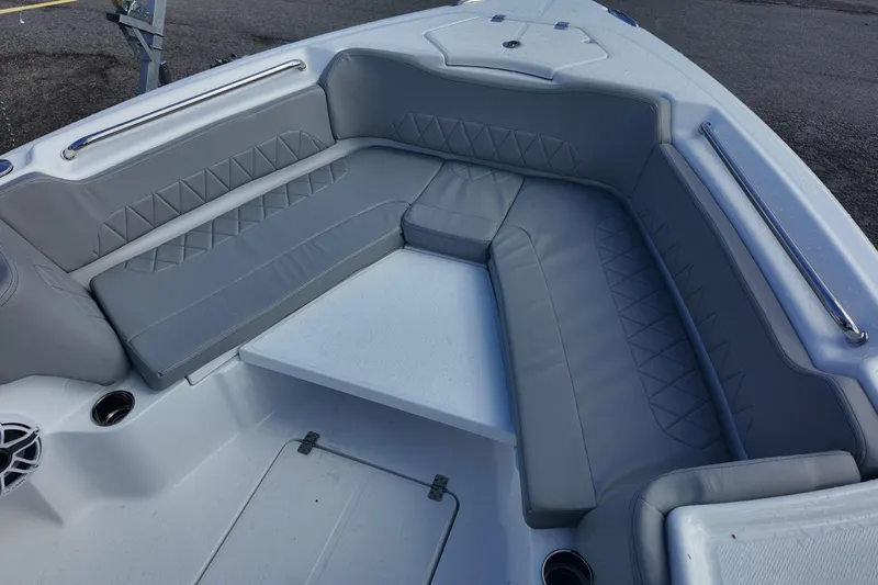 Slide: The Image of 2026 Blazer Bay Makaira 2800 boat interior with gray cushioned seating. - 9