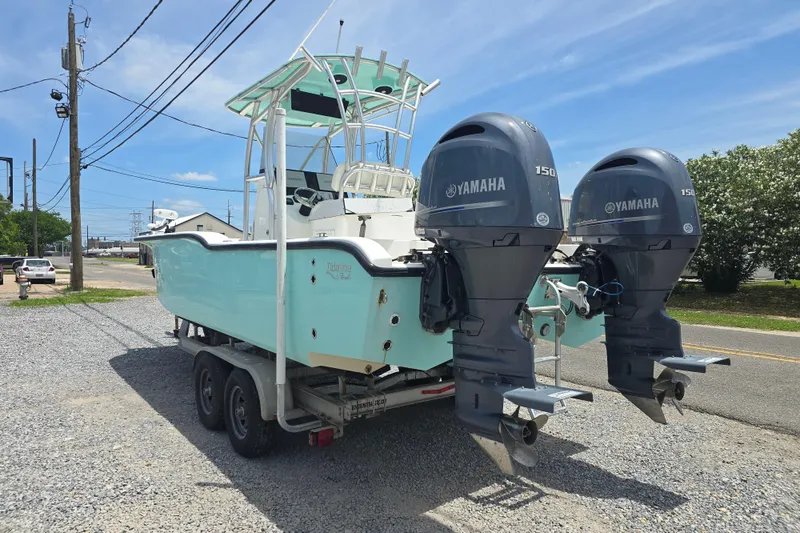 Slide: The Image of 2015 Tideline 235 boat with dual Yamaha 150 engines on a trailer. - 5