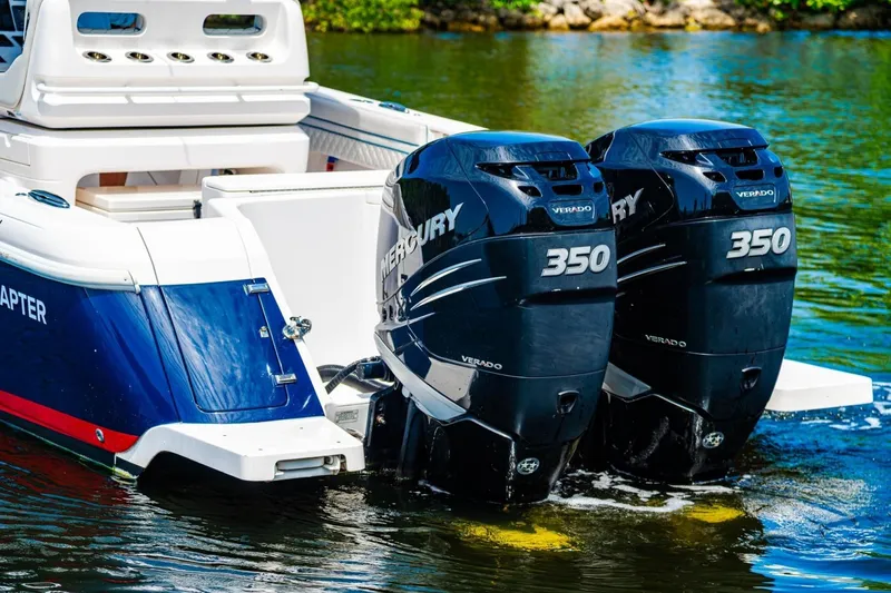 Slide: The Image of 2018 Intrepid 327 Center Console with twin Mercury 350 Verado engines on water. - 38