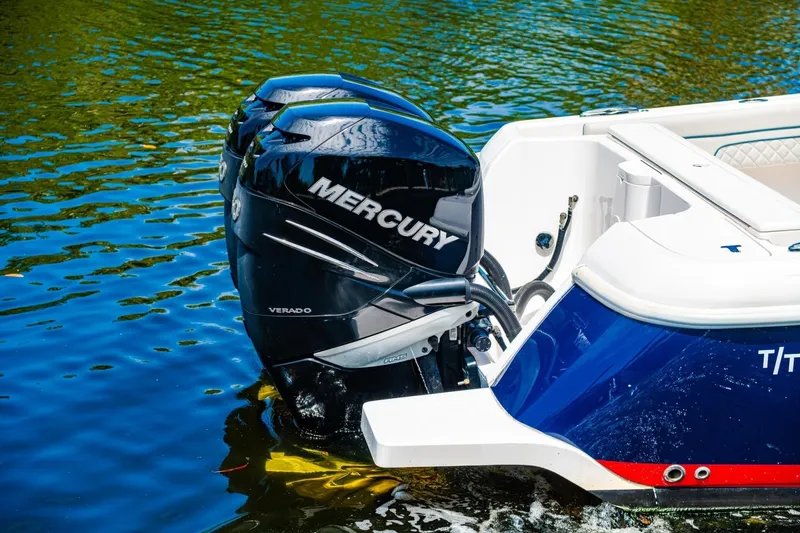 Slide: The Image of 2018 Intrepid 327 Center Console with Mercury Verado engine on water. - 39