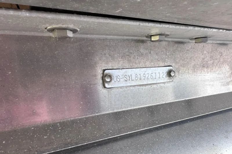 Slide: The Image of 2022 Sylvan L1 CRS metal identification plate with serial number. - 23