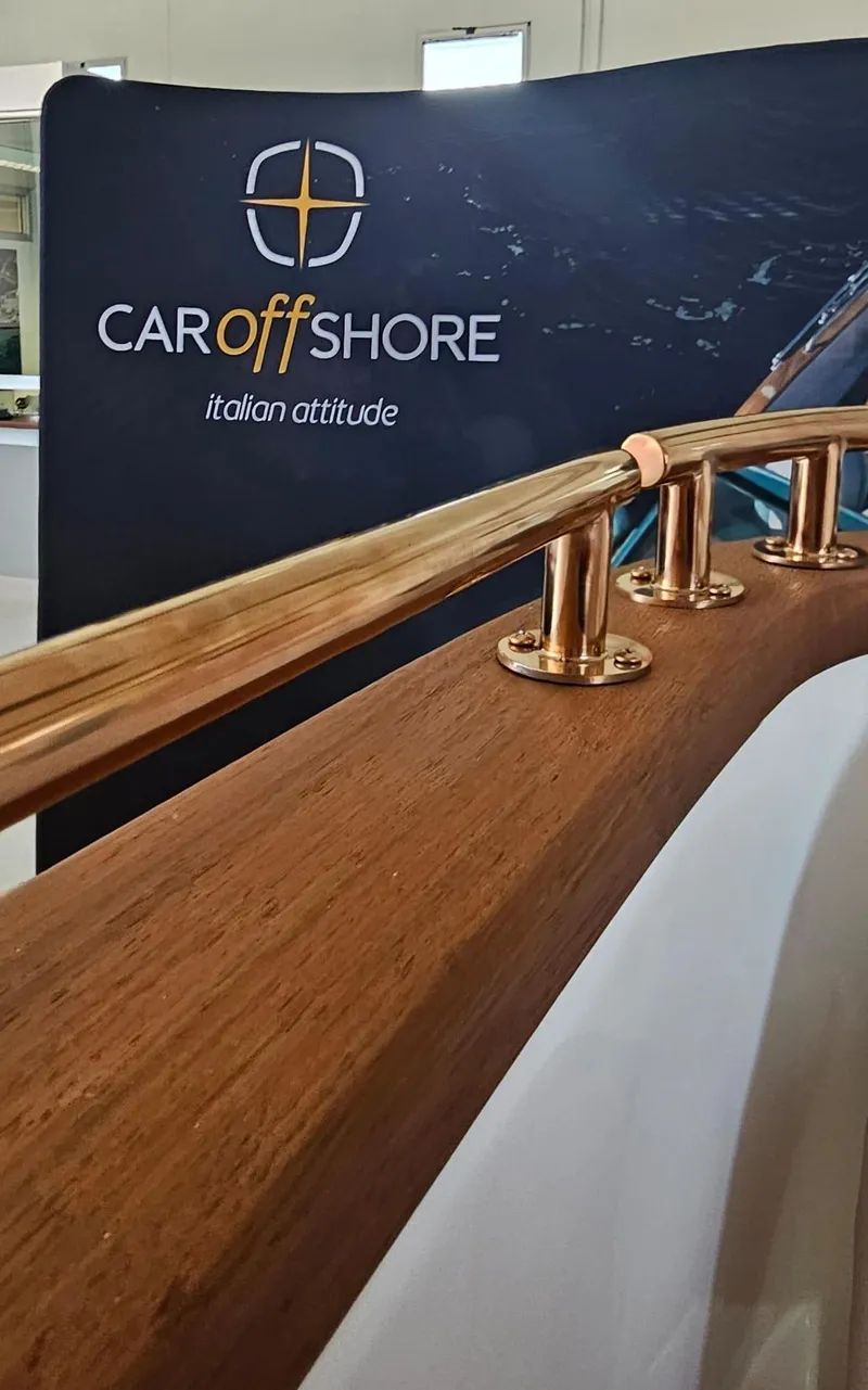Slide: The Image of 2026 Car Off-shore Fiat 500 Rose Gold display with elegant wood and metal detailing. - 12