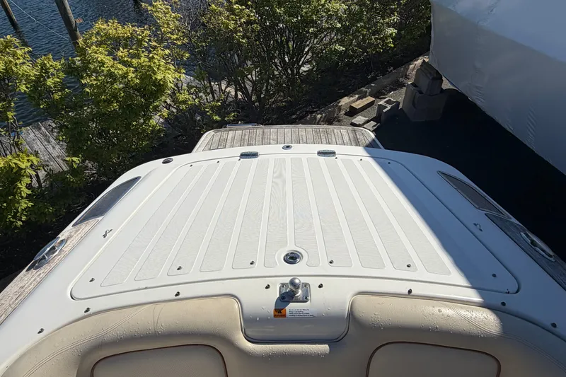 Slide: The Image of 2006 Chris-Craft Speedster boat deck, featuring sleek design and elegant detailing. - 11