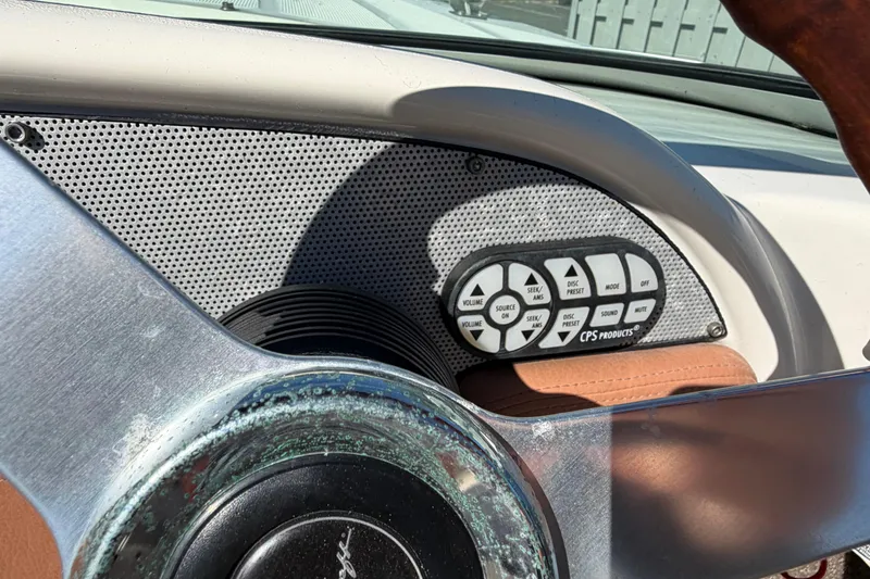Slide: The Image of 2006 Chris-Craft Speedster dashboard with control panel and steering wheel detail. - 29