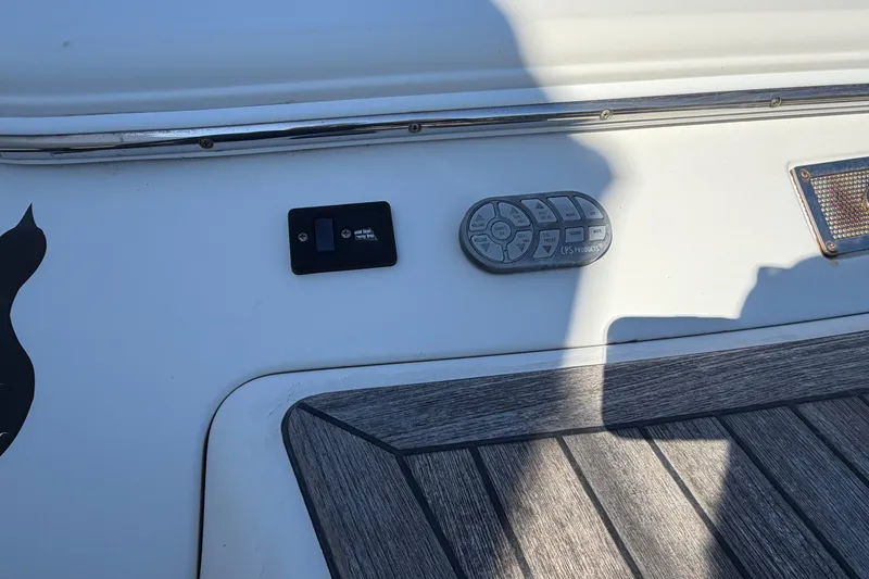 Slide: The Image of 2006 Chris-Craft Speedster boat controls and deck detail in sunlight. - 8