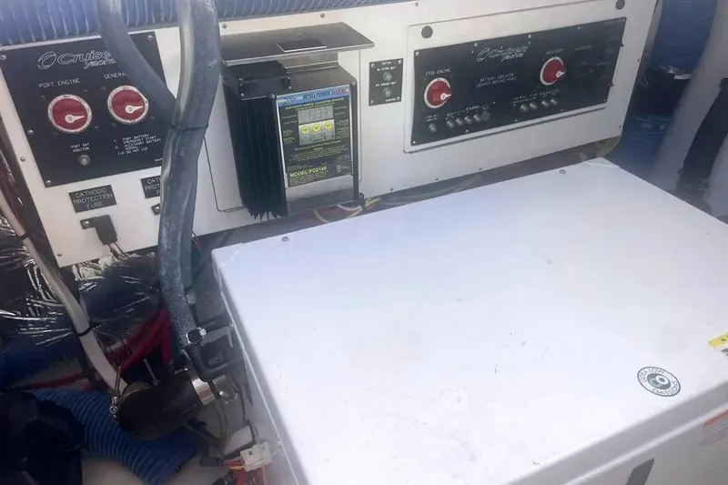 Slide: The Image of Control panel of a 2014 Cruisers Yachts 380 Express boat engine room. - 13