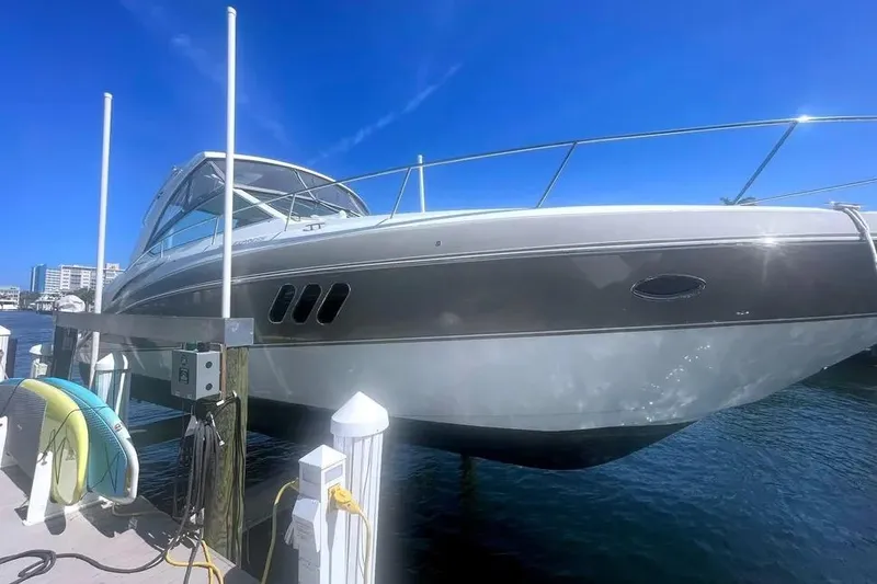 Slide: The Image of 2014 Cruisers Yachts 380 Express docked under clear blue sky. - 6
