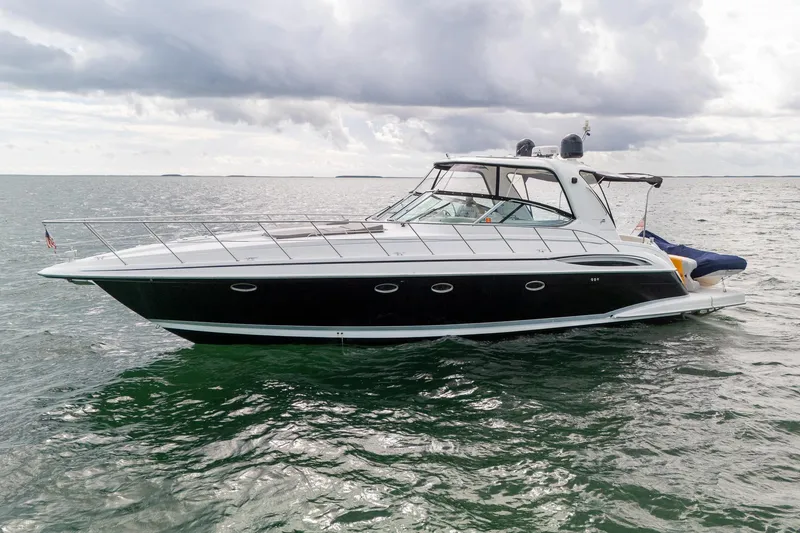 Slide: The Image of 2005 Formula 48 Yacht on calm sea under cloudy sky. - 42